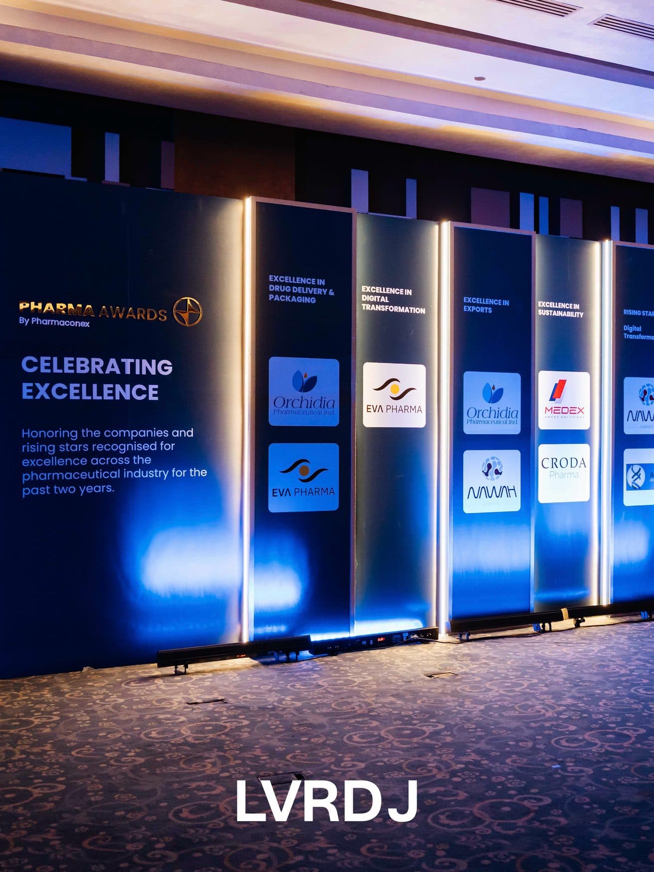 Backlit 'Celebrating Excellence' partner wall